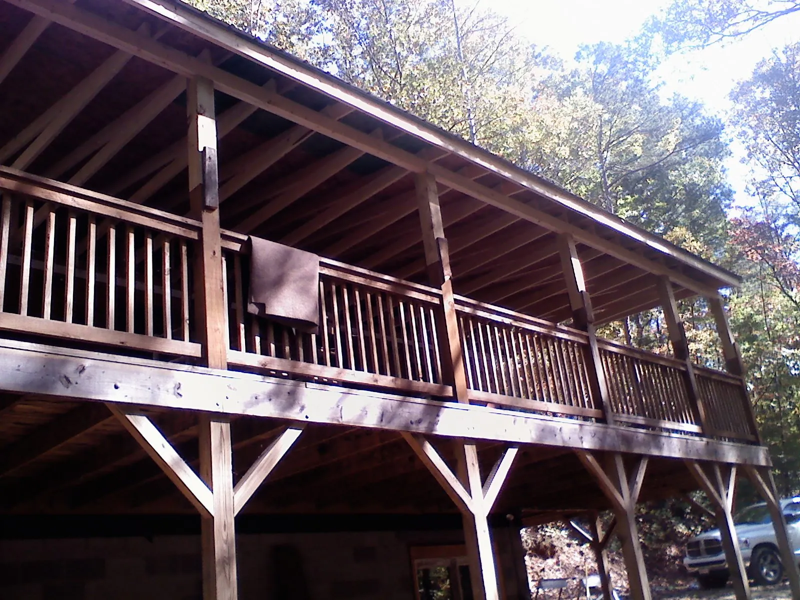 Timber framing under a new elevated porch and deck — Roof Leak Repair in Bankston by Roofing Brothers